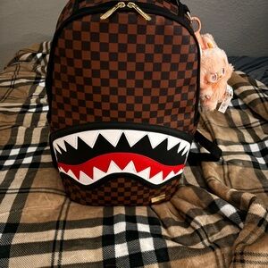 Brown sprayground with free labubu real